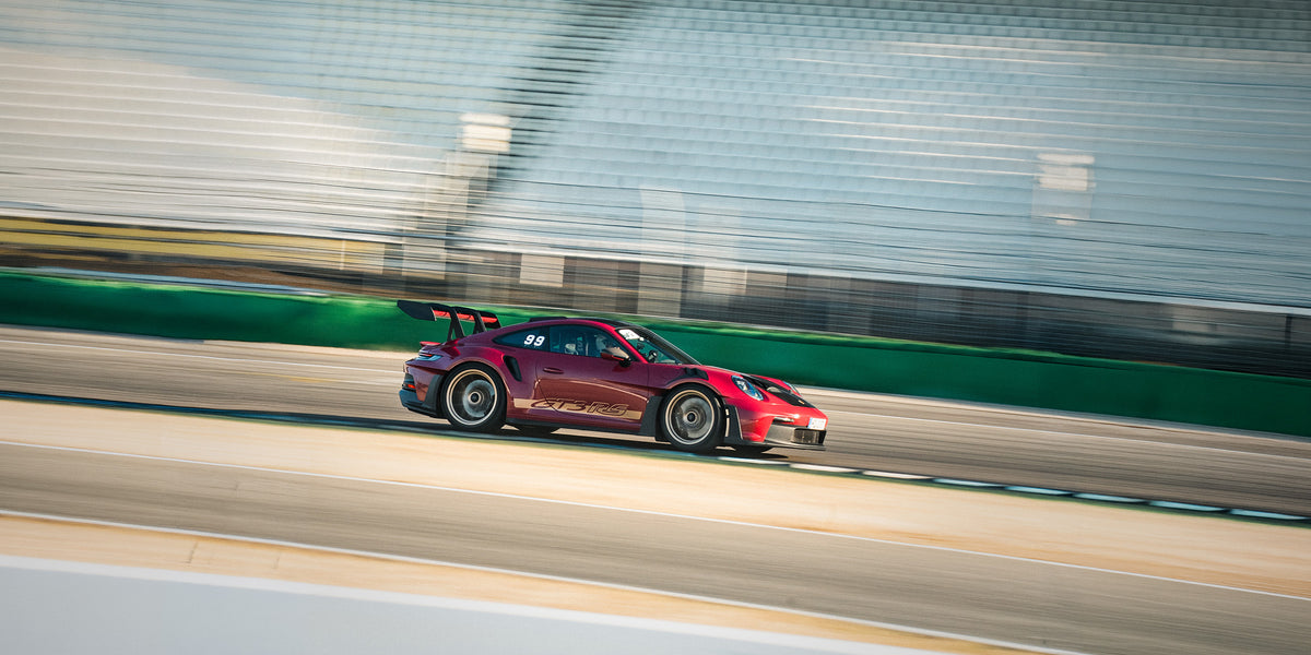 Porsche 911 GT3 RS at the exit of the Sachs corner on the Hockenheimring