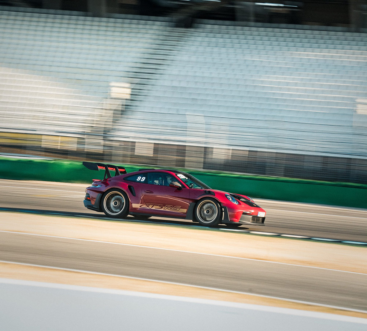 Porsche 911 GT3 R in heritage livery with race number 911 at the Misano World Circuit
